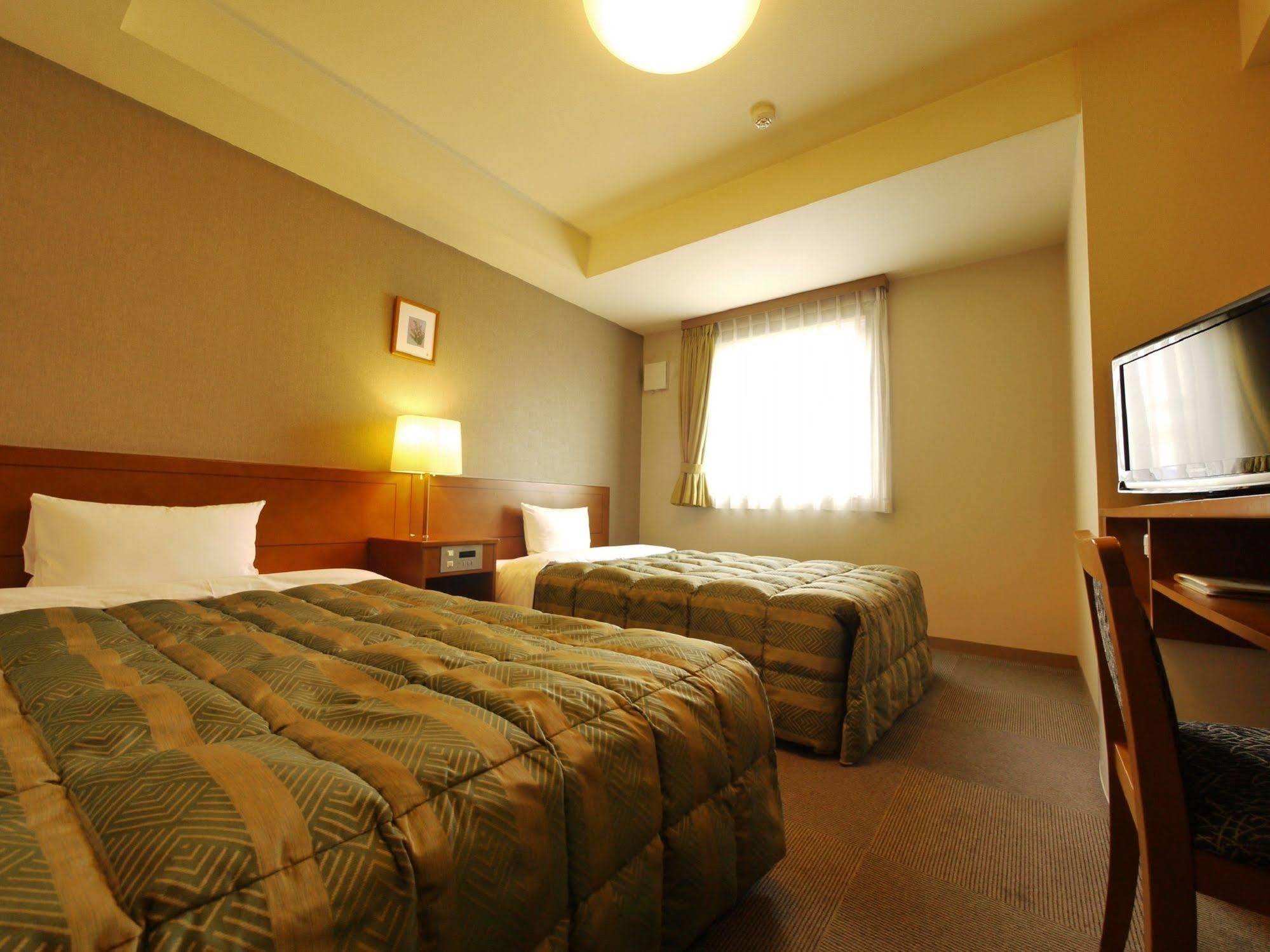Hotel Route-Inn Honjo Ekiminami Extérieur photo